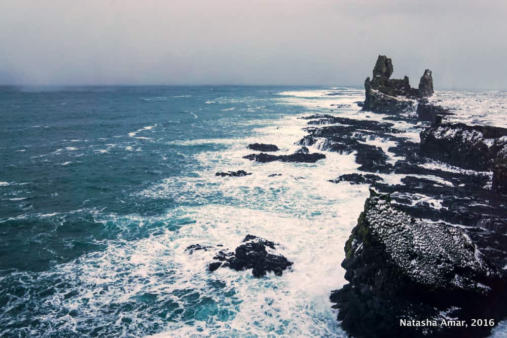 Londrangar- West Iceland Highlights- Snaefellsnes Peninsula: Remote and dramatic landscapes minus the crowds of the South Coast of Iceland, the Snaefellsnes Peninsula should be a must-do on your Iceland itinerary. 