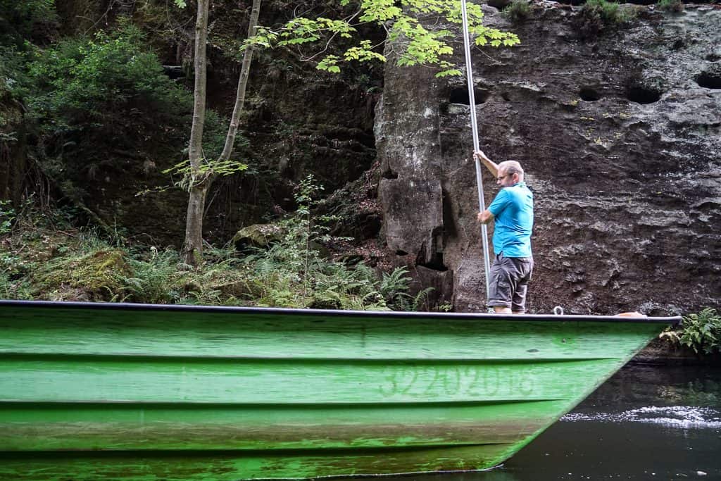 A boatman on the gorges of Kamenice in Bohemian Switzerland National park
