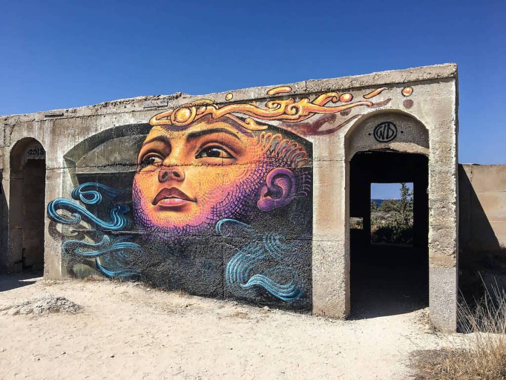 Graffiti in Aliko Beach: Enjoy a slice of island paradise on the best Naxos beaches in the popular Cyclades islands in Greece. From sandy beaches with crystal waters and secret coves for privacy, these are the best beaches in Naxos.